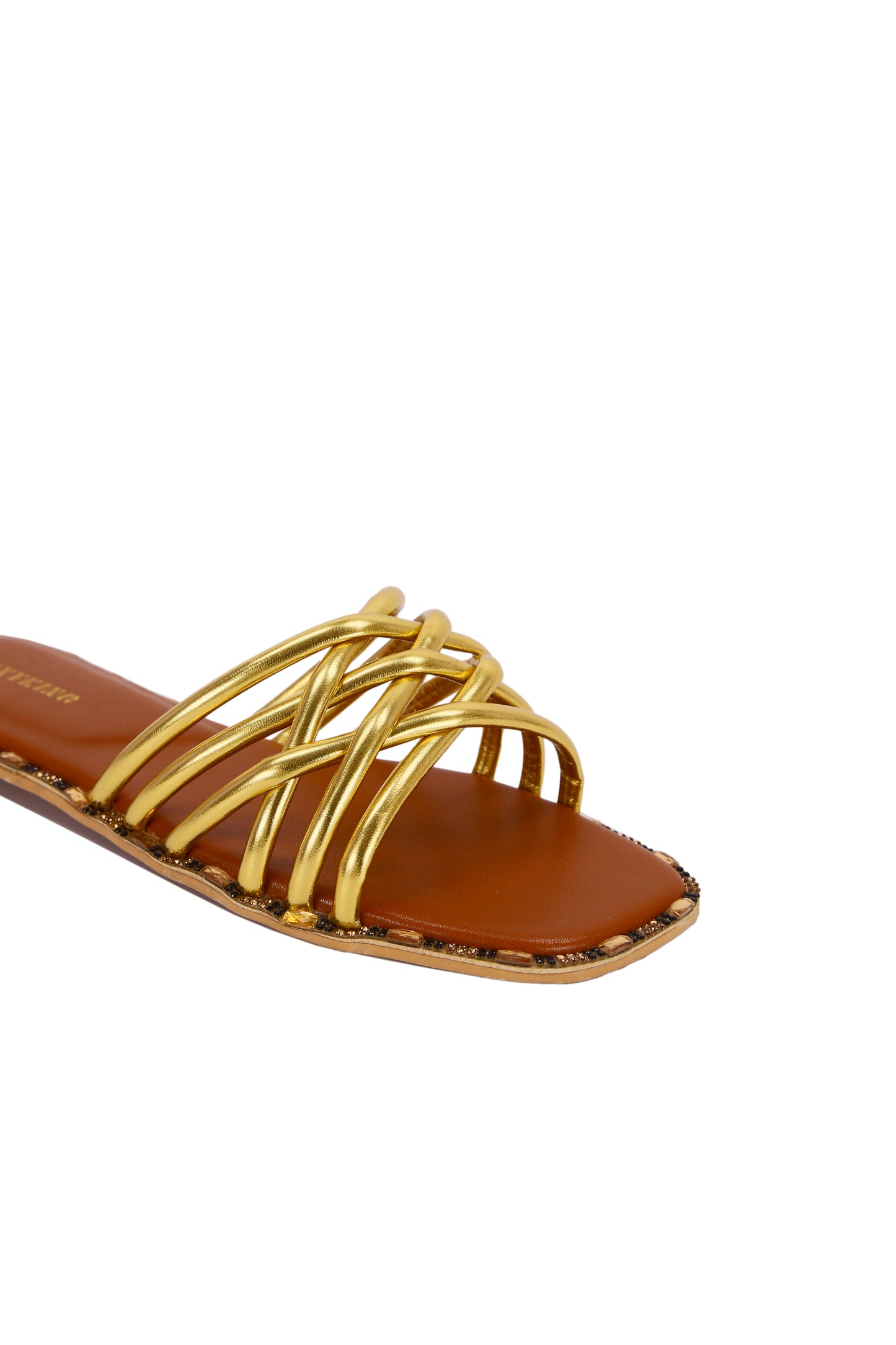 Comfortable and stylish women's slippers in luxurious metallic fabric and inlaid with rhinestones.